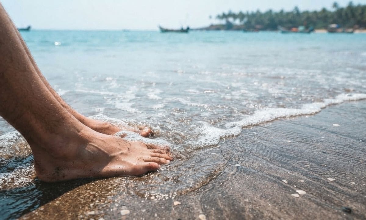 Feet in the sand for a Goa beach captions for Instagram shoreline photo